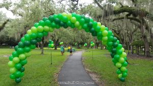 Outdoor Helium filled Walk Through arch and Bouquets
