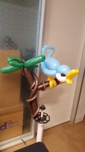 Blue bird on tree balloon for Uber's Partners party