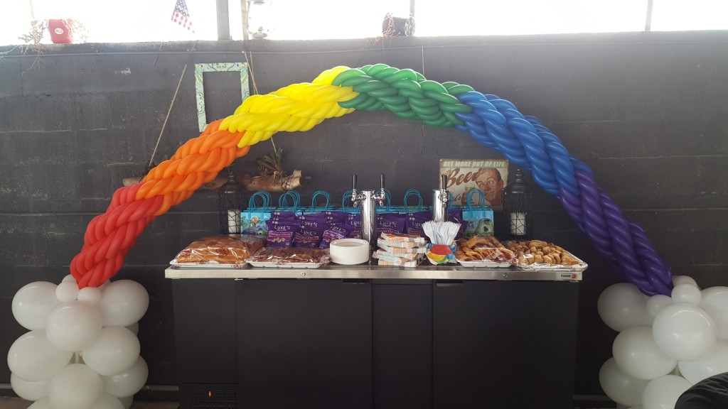 Chain weave rainbow balloon arch