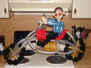 Guy on a motorcycle balloon