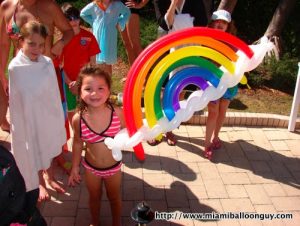 Happy child with a rainbow balloon