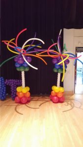 Rainbow colored funky balloon columns for the Arsht Pride event