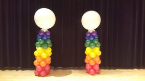 Rainbow tapering balloon columns for arsht pride event