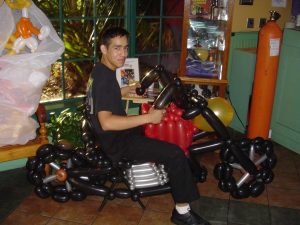 Sit in balloon motorcycle at Chevy's