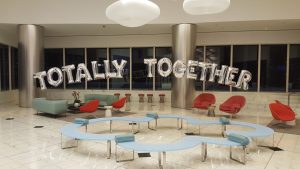 Totally Together giant balloon letters arch